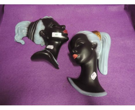 A pair of ceramic face masks by Cortendorf West Germany`