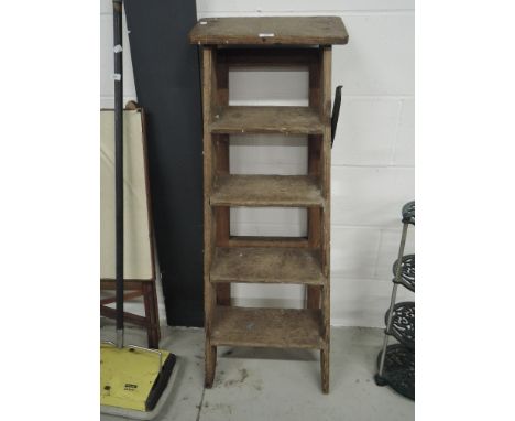 A set of wooden step ladders