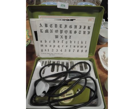 A Powerline model 72 engraving kit