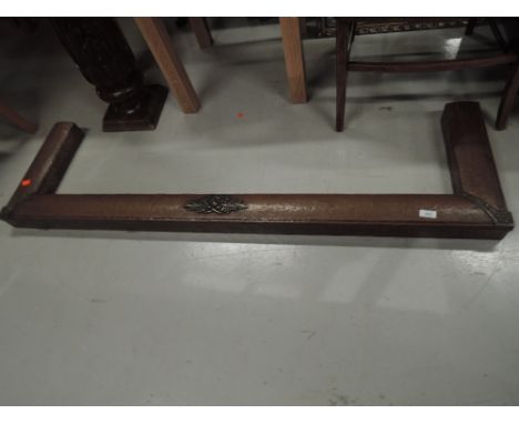 A vintage copper fire fender