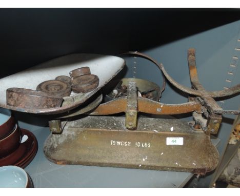 A selection of hardware including scales and small jam pan