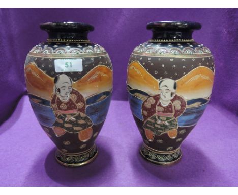 A pair of mirrored Japanese vaseCONDITION REPORT - SLIGHT GILT RUB TO BASE OF BOTH VASES  ONE VASE HAS REPAIR TO TOP