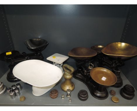 A selection of kitchen and weighing scales in various designs including mixed weight sets