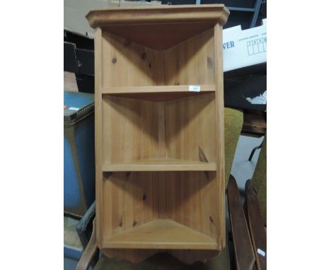 A modern pine corner wall shelf