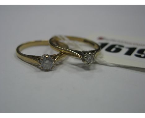 A 9ct Gold Single Stone Diamond Ring, claw set between tapered shoulders, stamped ".25"; another similar. (2)