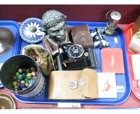 A Kodak Junior Folding Camera, novelty last iron money bank, early XX Century and later marbles, Zenith 7 x 18 field glasses 