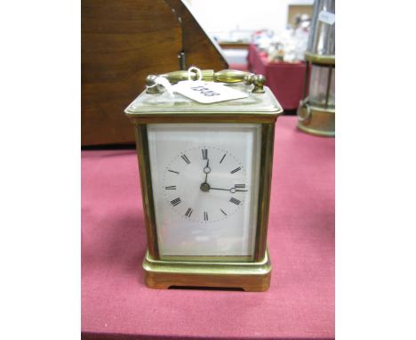 An Early XX Century French Carriage Clock, with enamel dial, Roman numerals.