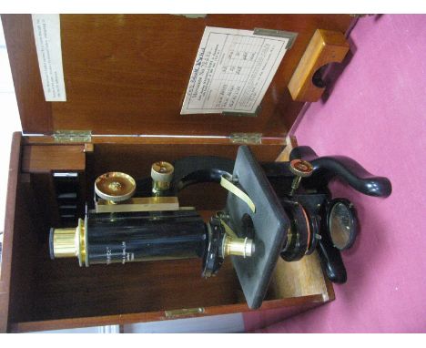 W.Watson and Sons Ltd London 72486 Microscope in a mahogany box, with lens. 