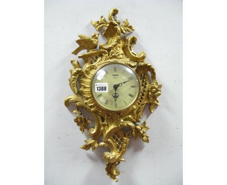 Smiths Eight Day Wall Clock, in a gilded metal surround featuring bird, scroll and latticework, 47cm high. 
