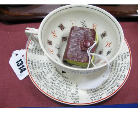 A Mid XX Century Gypsy Theresa's Fortune Telling Cup and Saucer, transfer print decoration of text and playing cards; and a m