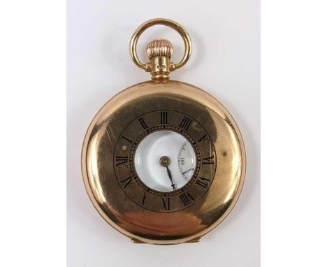 An unnamed 9ct gold half hunter pocket watch, the white enamel dial with black Roman numerals and blue steeled hands, the cas