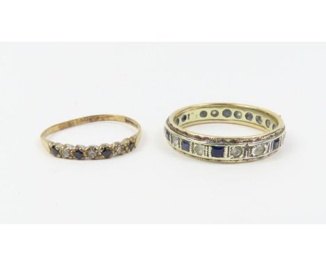 A 9ct gold synthetic stone full eternity ring, finger size R; and a 9ct gold sapphire and diamond half eternity ring, finger 