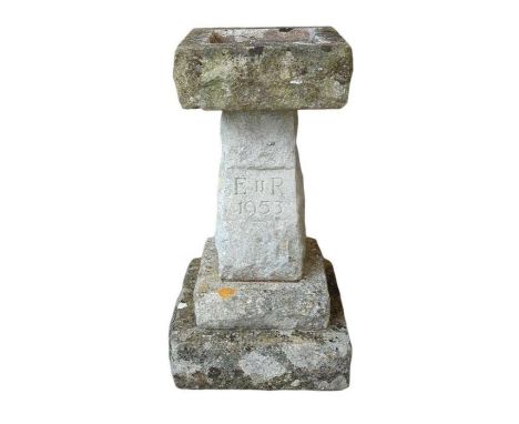 Carved stone sectional birdbath with engraving E II R 1953, 64cm high