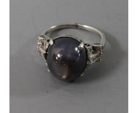 A Star Sapphire and Diamond Ring, first half 20th century