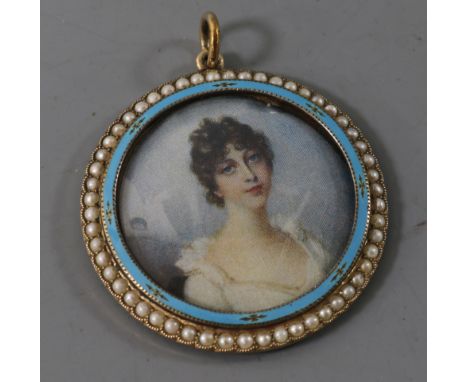 An Edwardian 9ct gold, seed pearl and enamel set locket portrait pendant, 37mm.