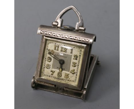 A 1920's engine turned silver Rolex travelling pendant watch, case 30mm.