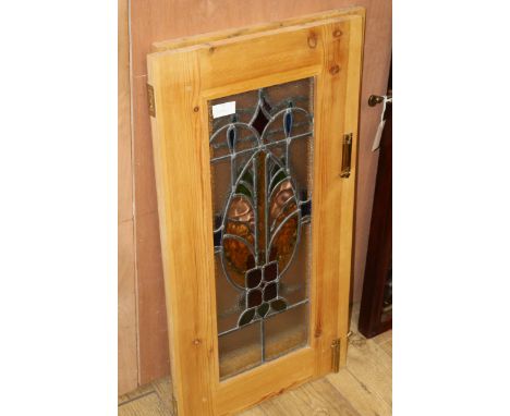 A pair of leaded light pine doors