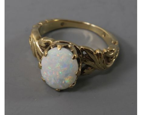 A 9ct? gold and white opal dress ring, size I.