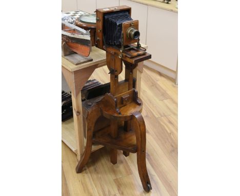 A 1896 instantograph camera and stand, Lancaster and Sons lens. H.116cm.