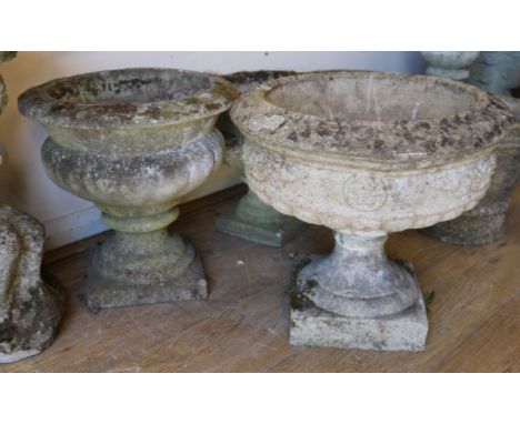 A campana urn shaped planter and two other planters W.46cm, 40cm and 35cm