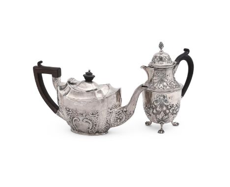 
	
		AN EDWARDIAN SILVER OVAL TEAPOT
		GEORGE NATHAN &amp; RIDLEY HAYES, CHESTER 1907
		With a wood finial and angular handle