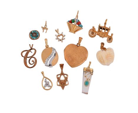 
	
		A COLLECTION OF CHARMS AND PENDANTS
		Comprising a heart shaped locket, decorated with stars, stamped 750; an oval shape
