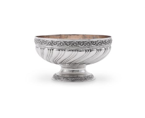 
	
		AN AMERICAN SILVER COLOURED PEDESTAL BOWL
		TIFFANY &amp; CO., CIRCA 1982
		With a chased foliate swag band, a wrythen l