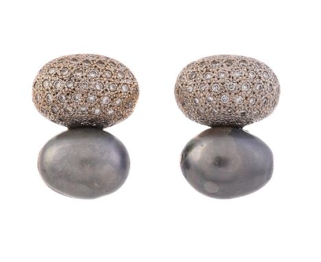 
	
		A PAIR OF SOUTH SEA CULTURED PEARL AND DIAMOND EAR STUDS, SIGNED EKA
		The pediments pavé set with brilliant cut diamond