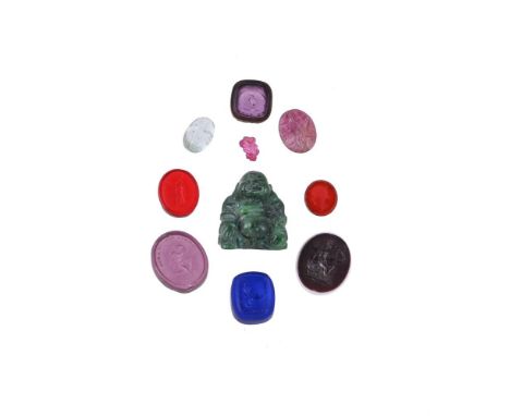 
	
		A SMALL COLLECTION OF CARVED STONES AND UNMOUNTED INTAGLIOS 
		To include an oval foliate carved ruby; a further leaf sh