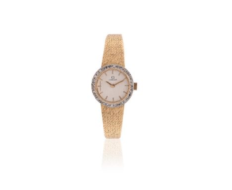 
	
		OMEGA, REF. 7244 
		A LADY'S 18 CARAT GOLD COLOURED AND DIAMOND BRACELET WATCH, NO. B78306
		Movement: Cal. 620, manual 