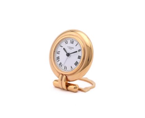 
	
		CARTIER, PASHA 
		A GILT METAL DESK ALARM CLOCK, NO. 0501152
		Movement: Quartz
		Case: Gilt metal case, screwed down ca