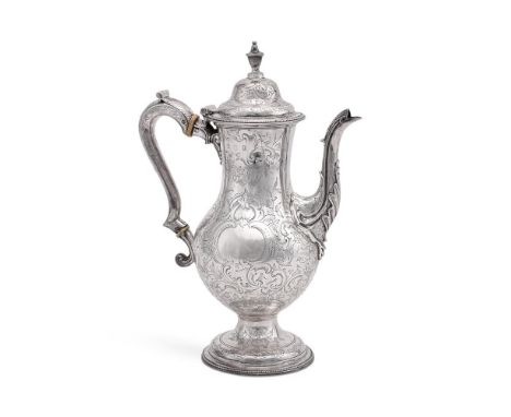 
	
		Y&nbsp;A GEORGE III SILVER BALUSTER COFFEE POT
		JAMES STAMP, LONDON 1779
		With an urn shaped finial to the ogee domed 