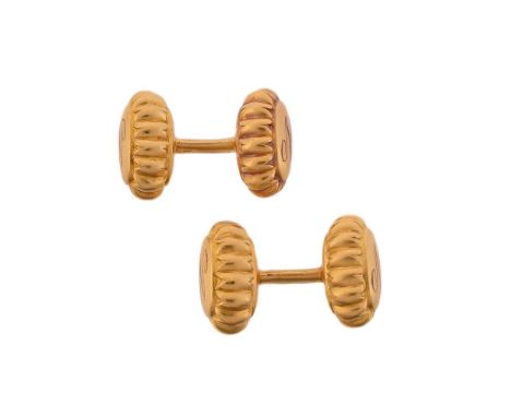 
	
		A PAIR OF EARLY 20TH CENTURY CUFFLINKS
		The cufflinks with oval panels with a scrolled N within a petal surround, to cu