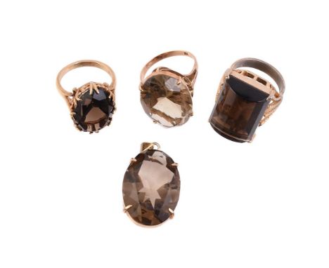 
	
		A SMALL COLLECTION OF 1970S SMOKY QUARTZ JEWELLERY
		Comprising a pale yellow smoky quartz dress ring, to a scrolled gal