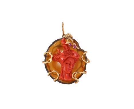 
	
		Y&nbsp;A CORAL, RUBY AND AGATE BROOCH PENDANT
		The agate panel with an applied coral carved as a lady's head in profile