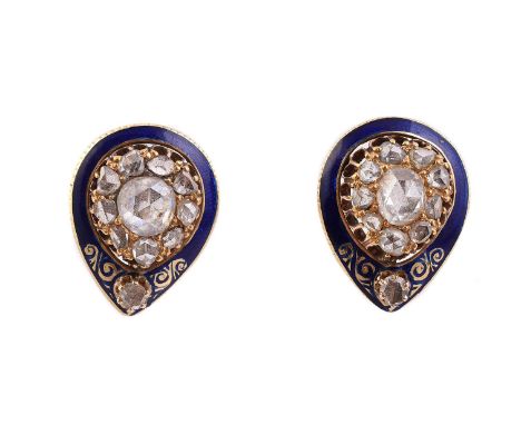 
	
		A PAIR OF ENAMEL AND DIAMOND EAR STUDS
		The pear shaped panels with blue enamel borders and scrolled detail, each centr