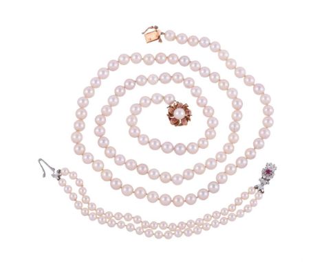 
	
		A CULTURED PEARL NECKLACE AND BRACELET
		The long strand of uniform cultured pearls to a ruby and diamond set flower hea