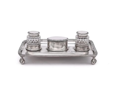 
	
		A LATE VICTORIAN SILVER OBLONG INKWELL
		HORACE WOODWARD &amp; CO. LTD., LONDON 1900
		With a lobed border, two pens tra