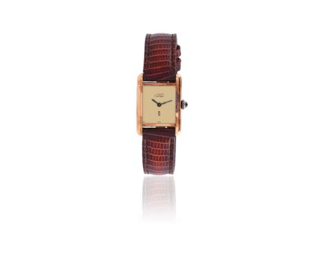 
	
		Y&nbsp;MUST DE CARTIER
		A LADY'S SILVER GILT WRIST WATCH, NO. 3 064329
		Movement: Cal. ETA 2512, manual wind, 17 jewel