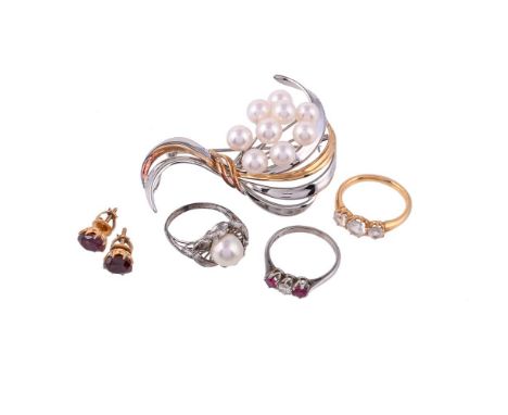 
	
		A SMALL COLLECTION OF JEWELLERY
		To include an 18 carat white gold three stone ruby and diamond ring, London 1985; a th