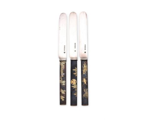 
	
		THREE VICTORIAN SILVER BLADED KNIVES
		REID &amp; SONS, LONDON 1886
		With Japanese bronze handles, inlaid with insects 