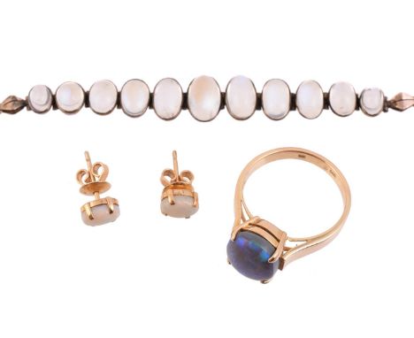 
	
		A SMALL COLLECTION OF JEWELLERY
		To include an opal dress ring, the oval cabochon opal in a four claw setting, to a pol