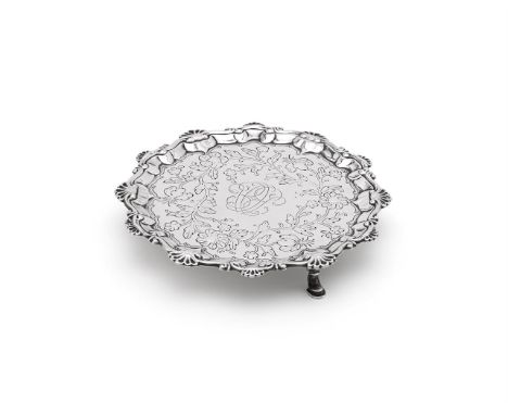 
	
		A GEORGE III SILVER SHAPED CIRCULAR SALVER
		PROBABLY BY THOMAS HANAM (OR HAMMOND) &amp; JOHN CARTER, LONDON 1765
		With
