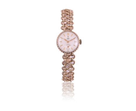 
	
		TUDOR 
		LADY'S 9 CARAT GOLD BRACELET WATCH, NO. 331743, CIRCA 1959
		Movement: Manual wind, 17 jewels
		Case: 9 carat g