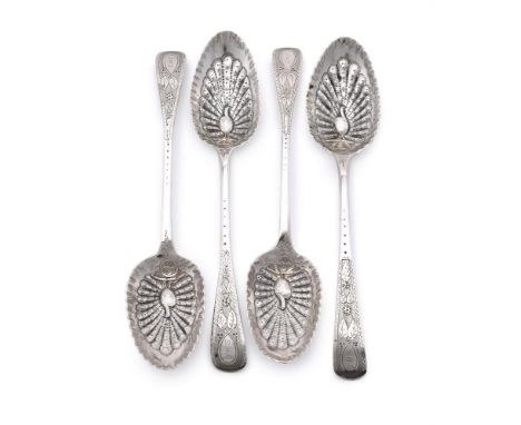 
	
		FOUR MATCHED SILVER BERRY SPOONS
		VARIOUS MAKERS AND DATES
		Engraved with foliate decoration and S.M.F within an oval 