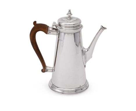 
	
		A SILVER TAPERING COFFEE POT
		TESSIERS LTD., LONDON 1930
		With a bell shaped finial to the ogee domed cover and a wood