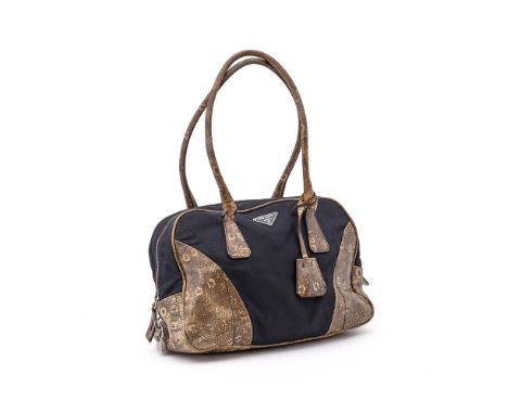 
	
		Y&nbsp;PRADA 
		A BLACK SATIN AND PYTHON TRIM HANDBAG
		With twin python loop handles, the zip opening to a monogrammed 
