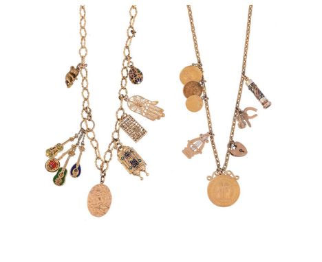 
	
		A GOLD COLOURED LONG CHAIN WITH CHARMS AND A GILT METAL CHAIN WITH CHARMS
		The first with rope twist belcher links to a
