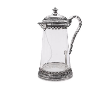 
	
		A LARGE SILVER MOUNTED SLIGHTLY TAPERING CLARET JUG
		FRANCIS HOWARD LTD., LONDON 2007
		With a lobed and beaded domed f