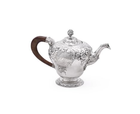 
	
		A GEORGE II SILVER INVERTED PEAR SHAPED TEAPOT
		JOHN SWIFT, LONDON 1748
		With a bud finial to the domed cover, a wood 